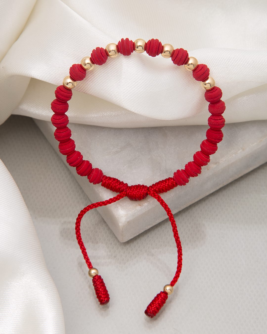 Red bracelets with 5mm smooth beads