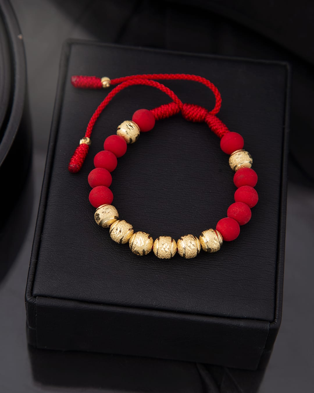 Red bracelet with 8mm shiny beads