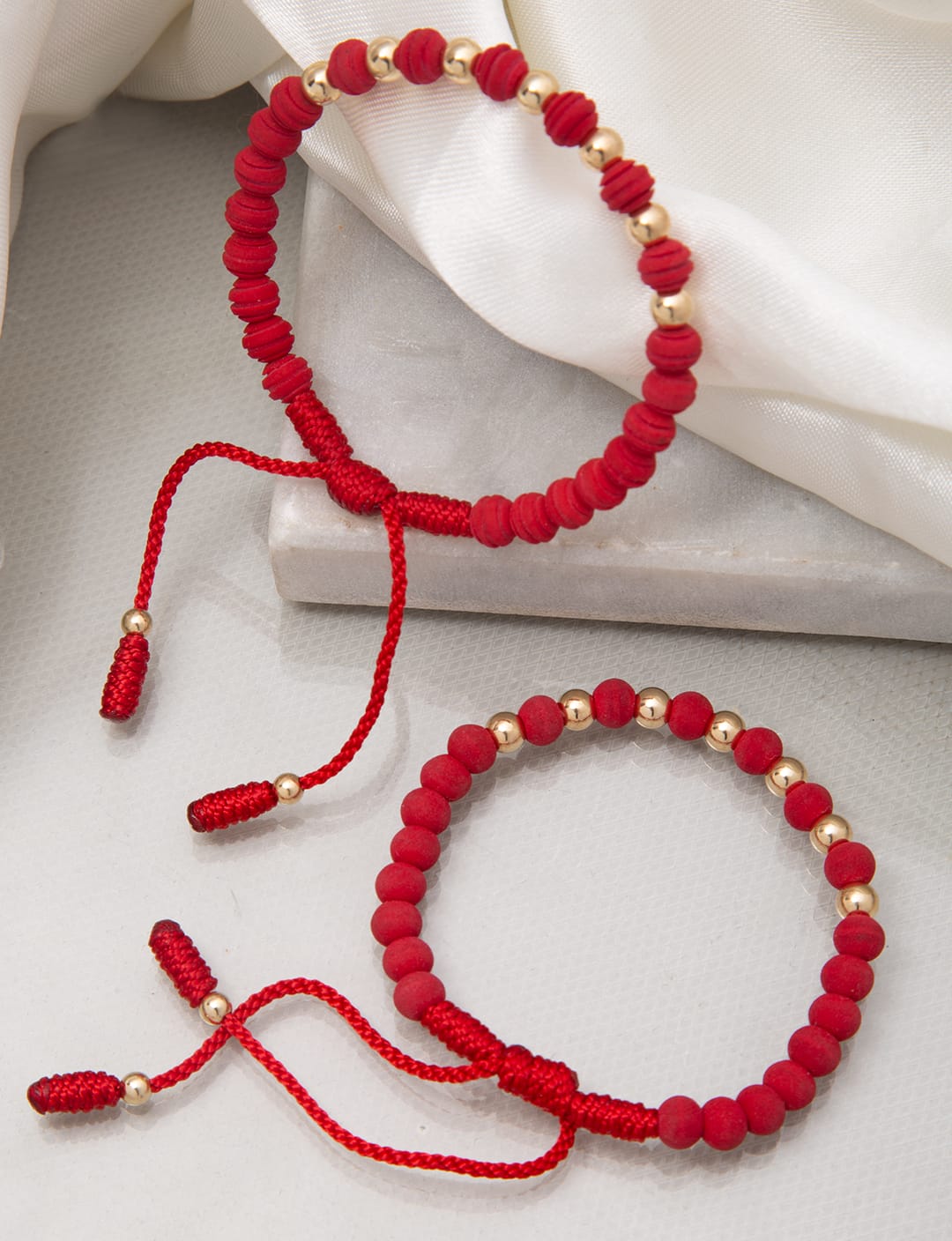 Red bracelets with 5mm smooth beads