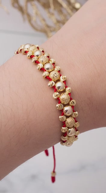 Red bracelet with smooth and shiny 4mm and 6mm beads